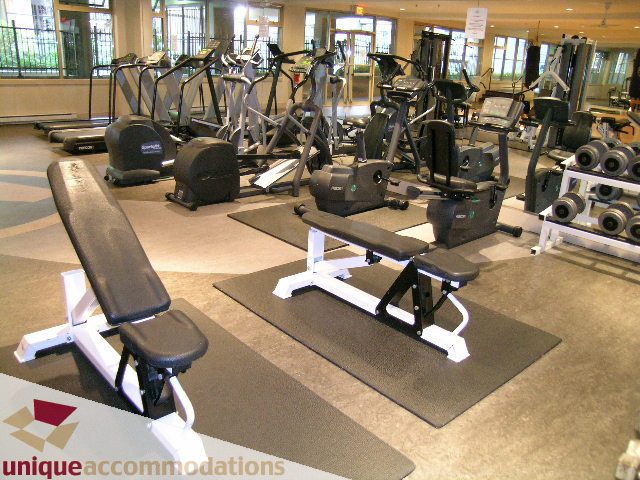 Furnished gym with cardio equipment and free weights. - 2001-1199 Seymour Street, Vancouver Downtown