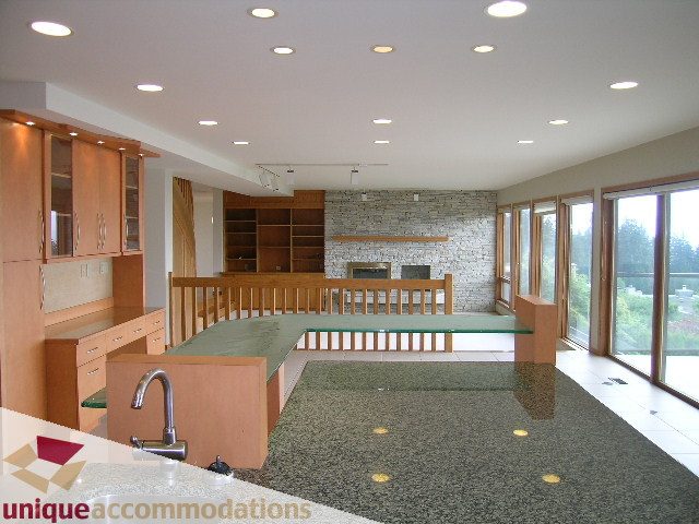 Bright kitchen with granite countertops and a city view. - 1472 Camridge Road, West Vancouver