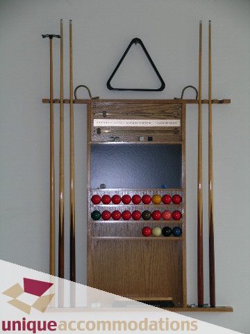 Furnished game room with pool table accessories and colorful balls. - 1472 Camridge Road, West Vancouver