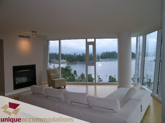Bright living room with large windows, city view, and modern furniture. - 502 - 1233 W. Cordova Street, Vancouver Downtown