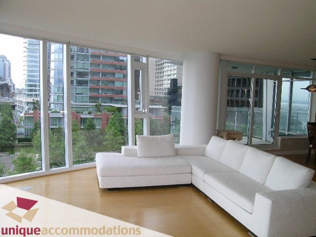 Spacious living room with large windows, hardwood floors, and a city view. - 502 - 1233 W. Cordova Street, Vancouver Downtown