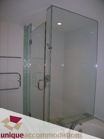 Furnished bathroom with glass shower enclosure and chrome fixtures. - 502 - 1233 W. Cordova Street, Vancouver Downtown
