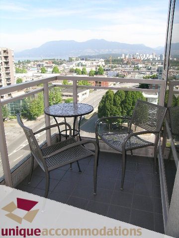 Furnished balcony with city view and outdoor seating. - 802-1590 West 8th Ave, Vancouver West Side