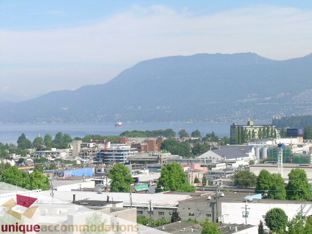 Furnished 2-bedroom + den with city view and modern decor. - 802-1590 West 8th Ave, Vancouver West Side