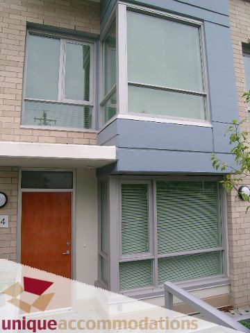 Furnished 2-bedroom + den townhouse with large windows and modern design. - 184 Chesterfield Avenue, North Vancouver