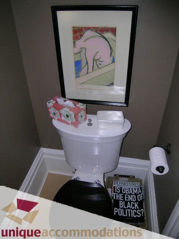 Furnished bathroom with framed art and tissue box. - 995 Bute Street "Rand House", Vancouver Downtown