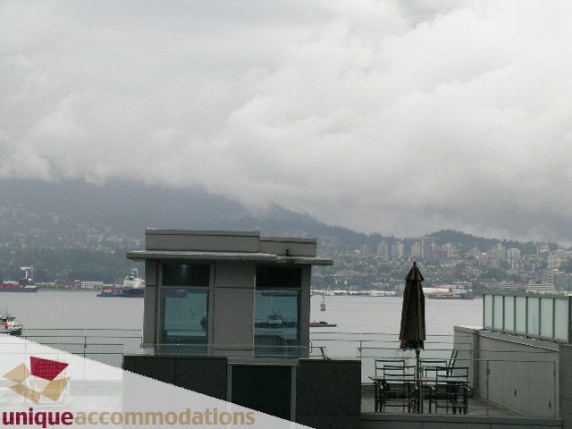 Bright living room with city view and waterfront, furnished. - TH3 - 1251 West Cordova Street, Vancouver Downtown