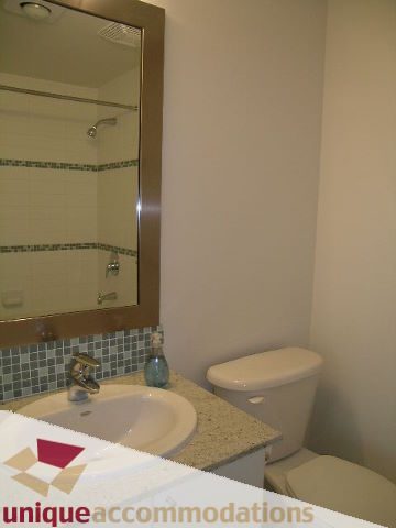 Bathroom with granite countertop and modern fixtures. - 1101 - 1188 West Pender, Vancouver Downtown