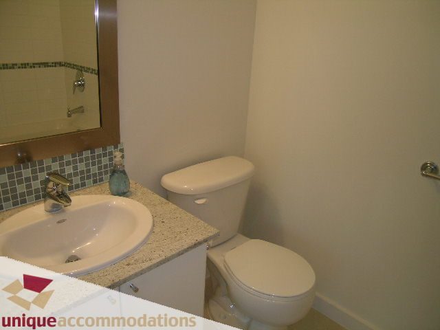 Bathroom with granite countertops and a modern sink. - 1101 - 1188 West Pender, Vancouver Downtown