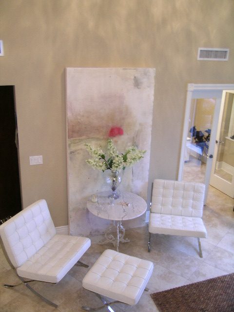 Bright living room with white furniture and abstract art, modern decor. - 202 -1280 Richards Street, Vancouver Downtown