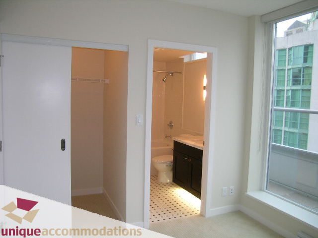 Bright and airy den with large windows, city view, and modern decor. - 1802 - 821 Cambie Street, Vancouver Downtown