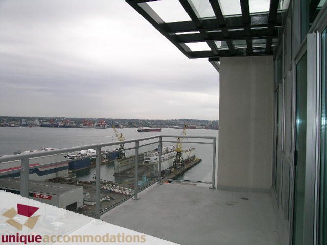 Spacious penthouse with a stunning city view and modern furnishings. - 2301 - 188 E Esplanade, North Vancouver