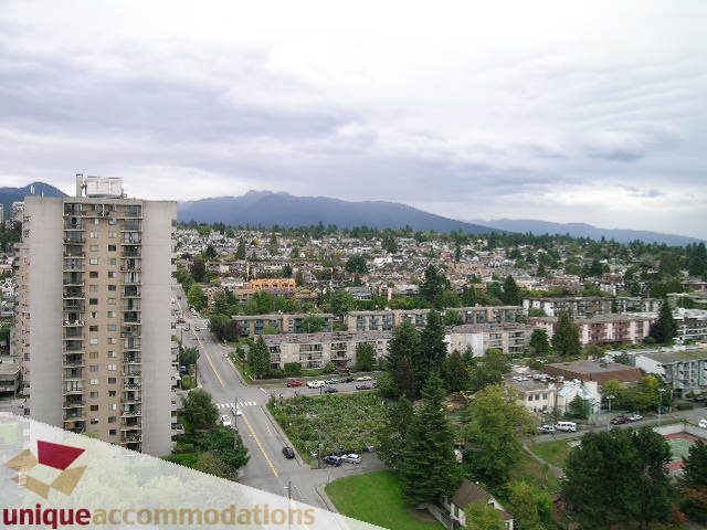 Penthouse with city view, furnished, spacious living area, modern decor. - 2301 - 188 E Esplanade, North Vancouver