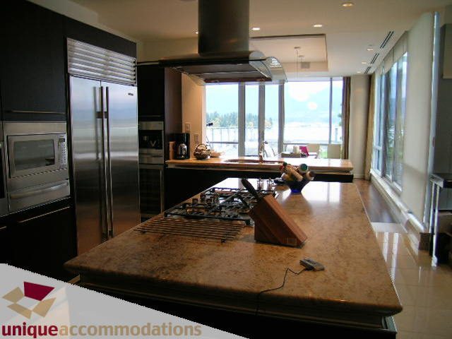 Bright kitchen with granite countertops, stainless steel appliances, and a city view. - 302 - 1169 West Cordova, Vancouver Downtown