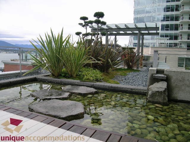 Furnished patio with water feature and city view. - 302 - 1169 West Cordova, Vancouver Downtown