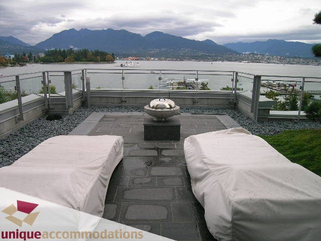Furnished rooftop patio with city view and outdoor seating. - 302 - 1169 West Cordova, Vancouver Downtown