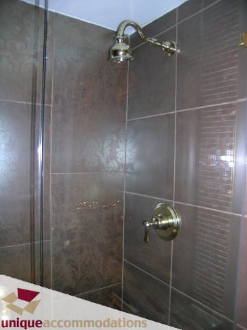 Furnished bathroom with modern shower and glass door. - 2201 - 1415 West Georgia, Vancouver Downtown
