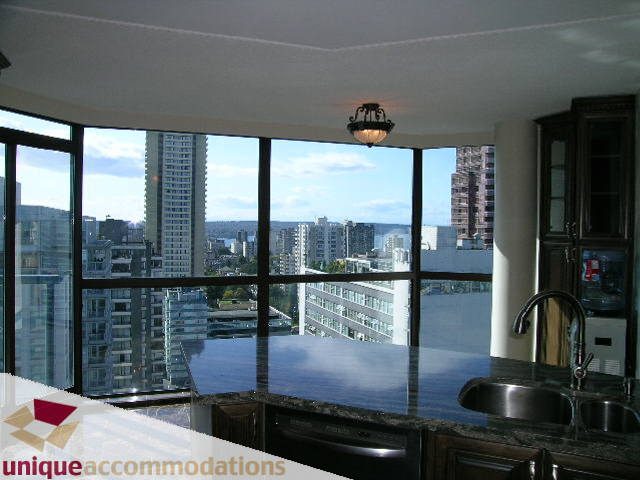 Bright kitchen with granite countertops and a stunning city view. - 2201 - 1415 West Georgia, Vancouver Downtown
