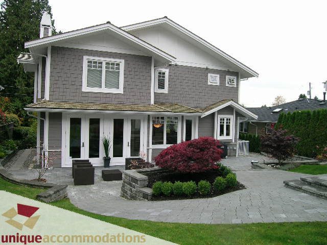 Spacious 4-bedroom house with a large front porch and landscaped garden. - 1365 Kings Ave, West Vancouver