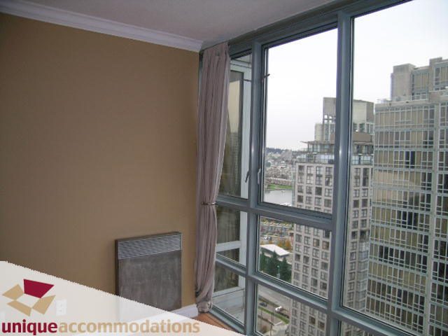 Bright living room with large windows offering a city view. - 2803 - 930 Cambie Street, Vancouver Downtown