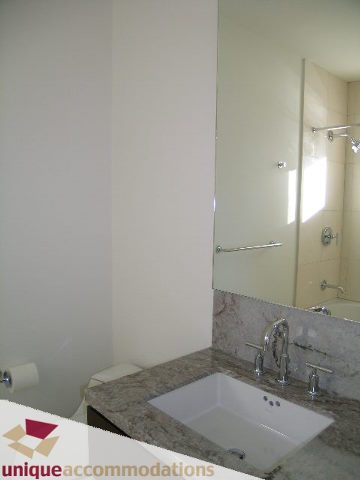 Bright bathroom with granite countertop and modern sink. - 104 - 1139 West Cordova Street, Vancouver Downtown