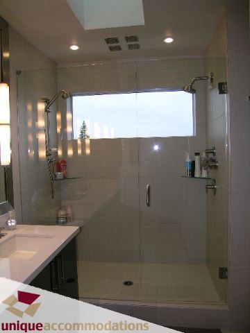 Furnished bathroom with glass shower and modern vanity. - 2429 West 19th Avenue, Vancouver West Side