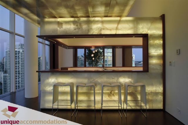 Furnished living room with marble accents and city view. - 2601 - 1000 Beach Avenue, Vancouver Downtown
