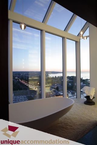 Spacious bathroom with a stunning city view and modern bathtub. - 2601 - 1000 Beach Avenue, Vancouver Downtown