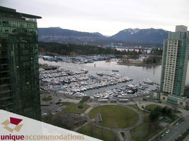 Spacious 2-bedroom + den condo with stunning city and marina views. - 2401-1277 Melville, Vancouver Downtown