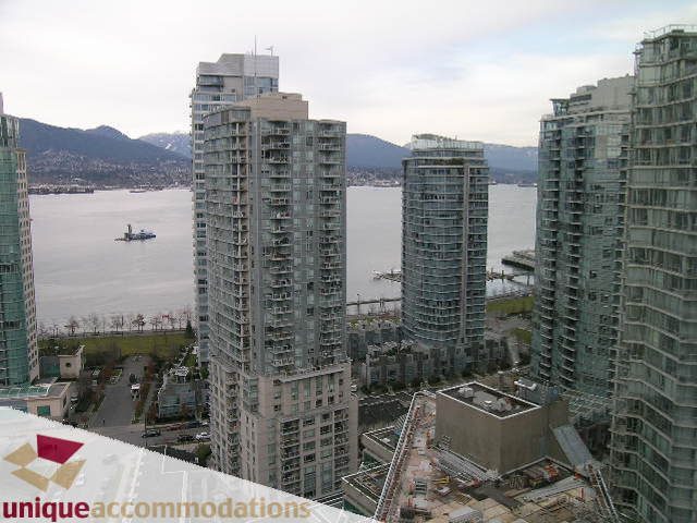 Spacious 2-bedroom + den condo with stunning city view and modern furnishings. - 2401-1277 Melville, Vancouver Downtown