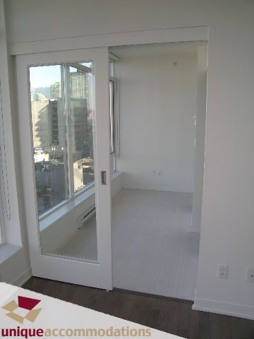 Bright living room with hardwood floors and city view. - 1004 - 1252 Hornby Street, Vancouver Downtown