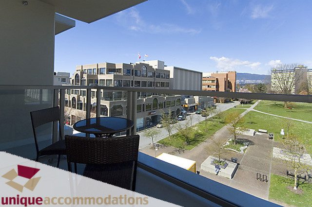Furnished balcony with city view and outdoor seating. - 404 - 1808 West 1st Avenue, Vancouver West Side