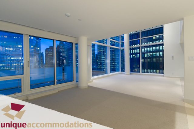 Spacious living room with large windows, city view, and modern furnishings. - 903 - 1139 West Cordova Street, Vancouver Downtown