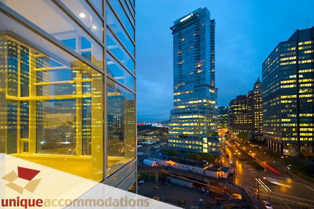 Furnished 2-bedroom condo with stunning city view at dusk. - 903 - 1139 West Cordova Street, Vancouver Downtown