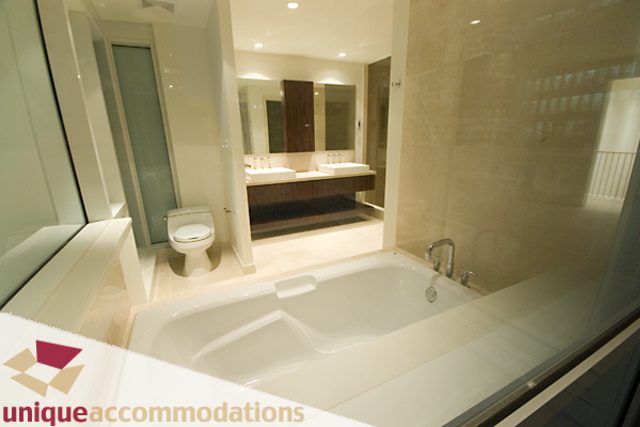 Spacious bathroom with modern fixtures and large mirror. - 903 - 1139 West Cordova Street, Vancouver Downtown