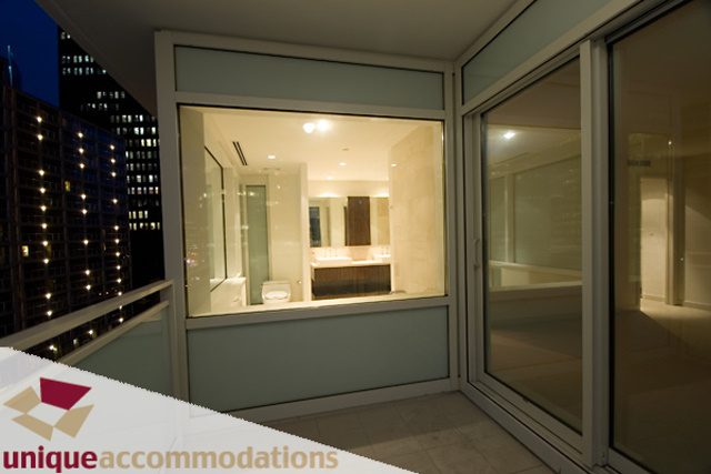 Furnished living room with city view and modern decor. - 903 - 1139 West Cordova Street, Vancouver Downtown