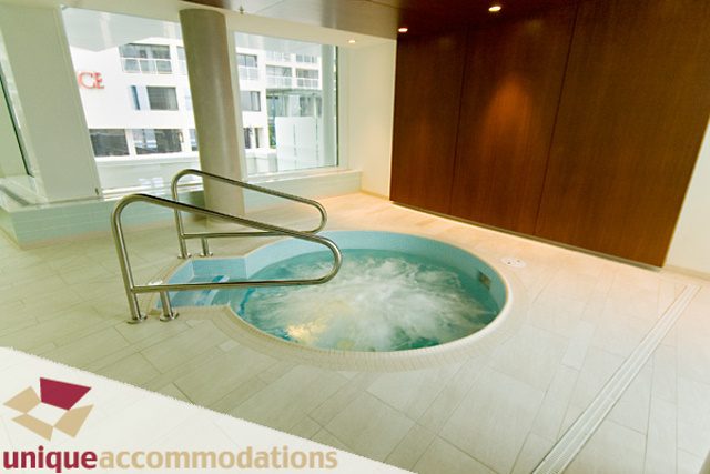 Spacious bathroom with modern fixtures and a city view. - 903 - 1139 West Cordova Street, Vancouver Downtown