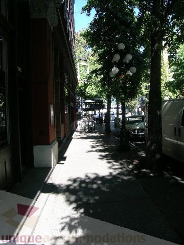 Furnished patio with trees and street view. - 405 - 233 Abbott Street, Vancouver Downtown