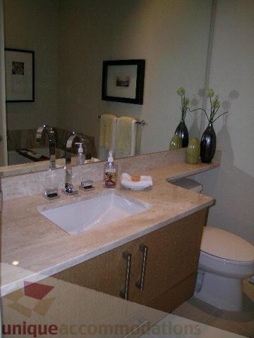 Furnished bathroom with marble countertops and modern fixtures. - 102 - 1333 West 11th Ave., Vancouver West Side