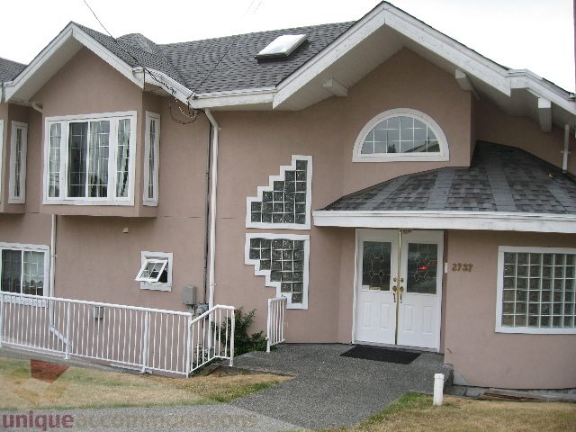 Furnished 4-bedroom house with unique architectural details and a front porch. - 2737 Mahon Ave., North Vancouver