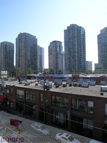 Furnished 1-bedroom condo with city view and modern furnishings. - 408 - 1066 Hamilton Street, Vancouver Downtown