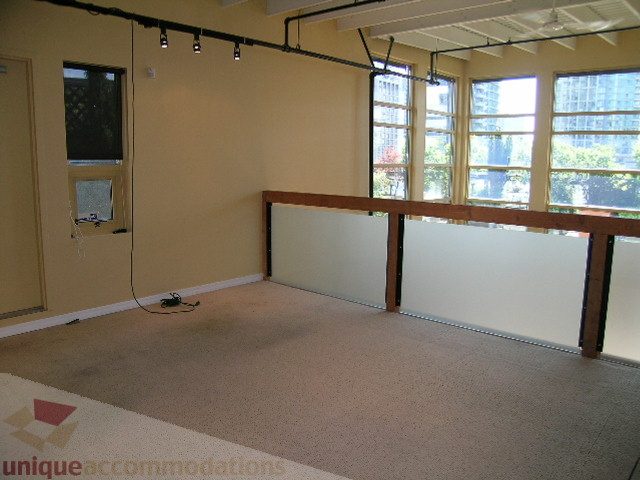 Spacious living room with large windows and city view. - 408 - 1066 Hamilton Street, Vancouver Downtown