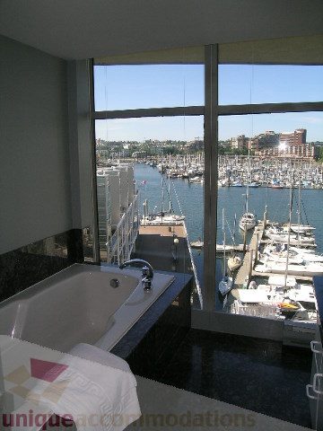 Furnished kitchen with a stunning city view and modern countertops. - 310 - 990 Beach, Vancouver Downtown