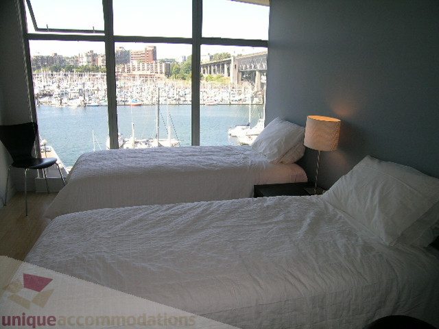 Furnished 2-bedroom condo with a stunning city view and hardwood floors. - 310 - 990 Beach, Vancouver Downtown