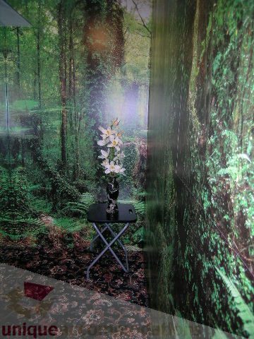 Furnished living room with a forest-themed mural, modern decor, and a cozy ambiance. - 1403 - 555 Jervis Street, Vancouver Downtown