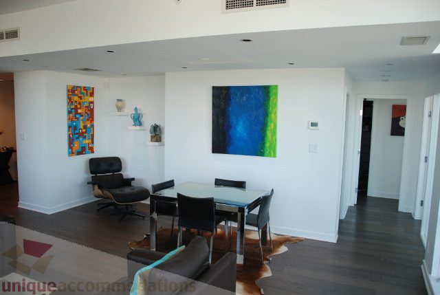 Furnished living room with modern art and comfortable seating. - 2702 - 638 Beach Crescent, Vancouver Downtown