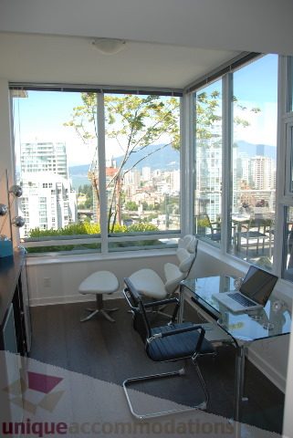 Bright living room with city view and modern furniture. - 2702 - 638 Beach Crescent, Vancouver Downtown