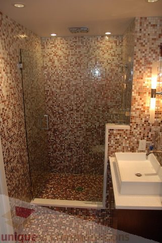 Spacious bathroom with mosaic tile walls and a glass shower enclosure. - 2702 - 638 Beach Crescent, Vancouver Downtown