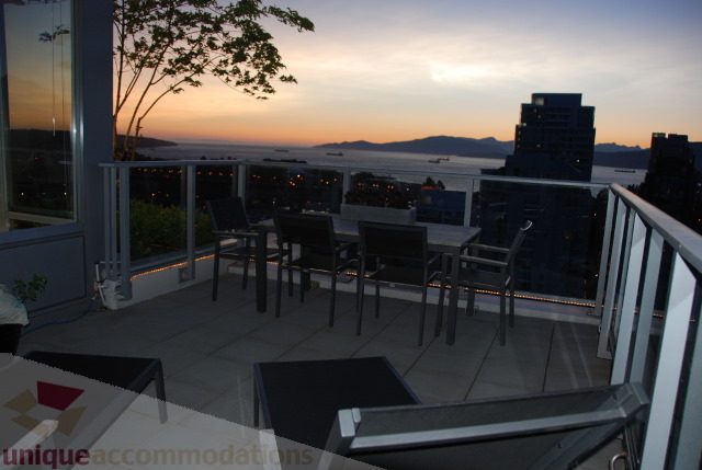 Furnished balcony with city view and outdoor seating. - 2702 - 638 Beach Crescent, Vancouver Downtown
