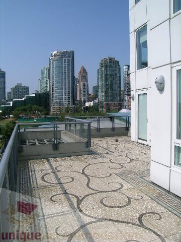 Bright balcony with mosaic tile flooring and city view. - 603 - 1383 Marinaside Crescent, Vancouver Downtown